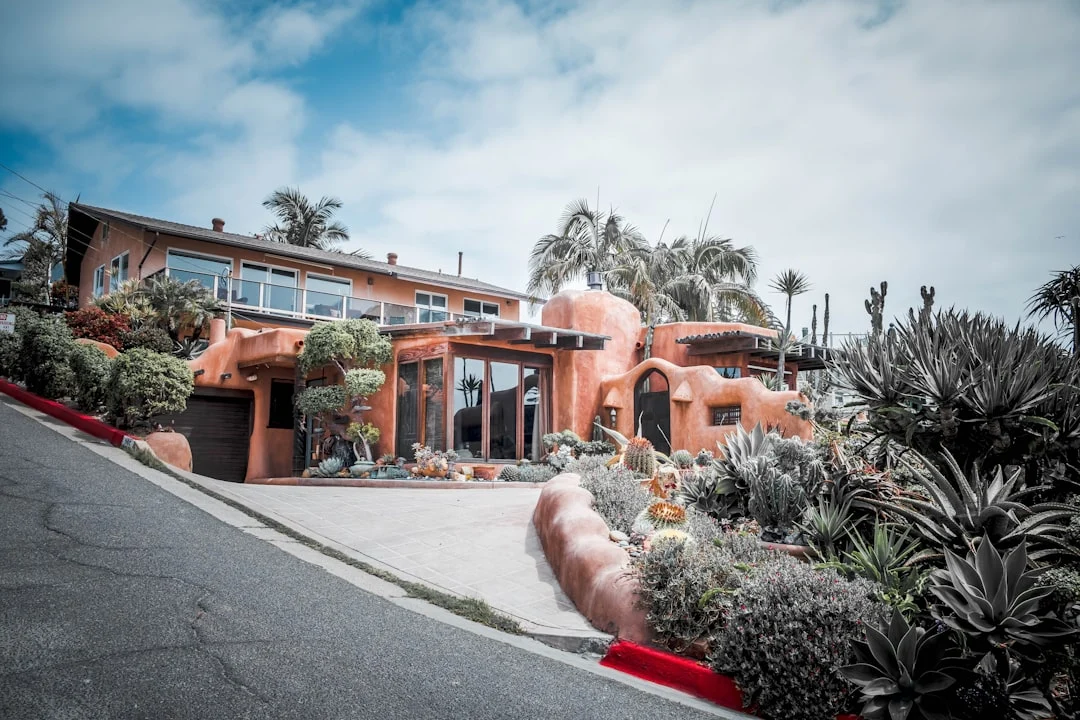 brown concrete building near green trees during daytime. related to How to Create an Authentic Mid-Century Modern Home Without Buying Expensive Originals