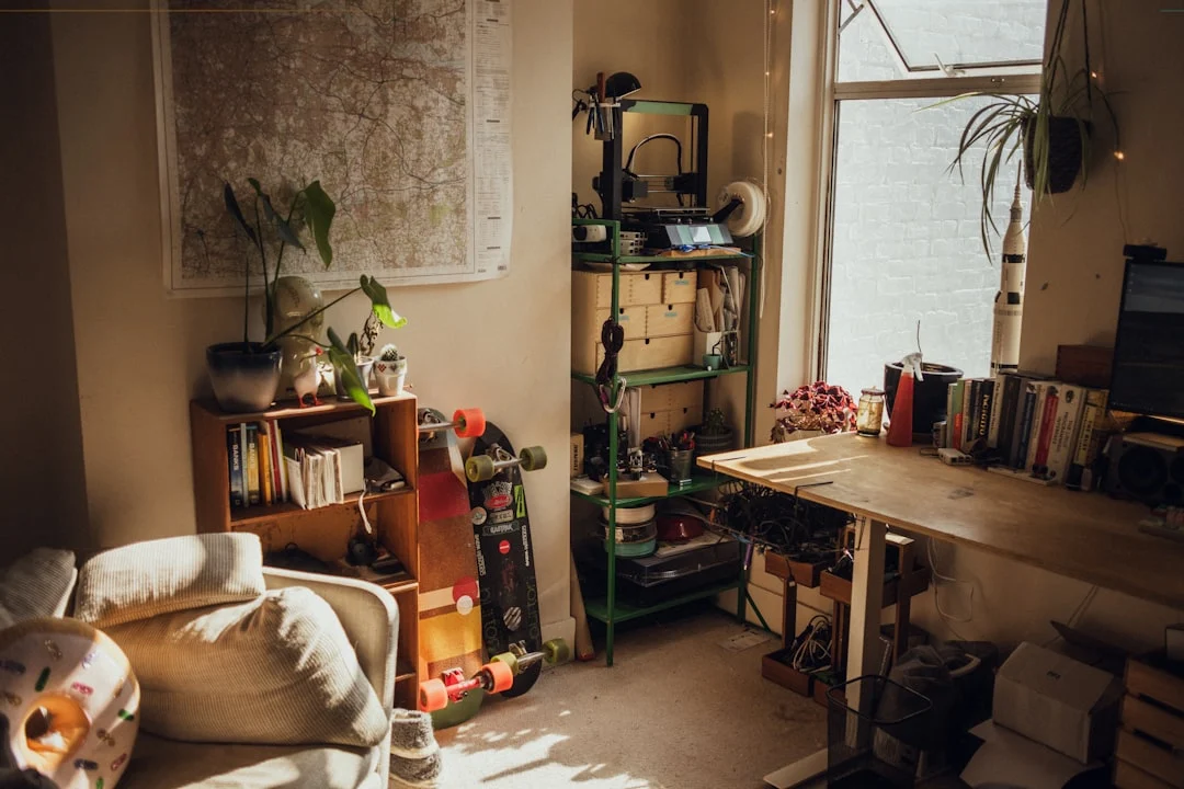 green potted plant on brown wooden table. related to Aesthetic Room Decor: Curate Instead of Clutter
