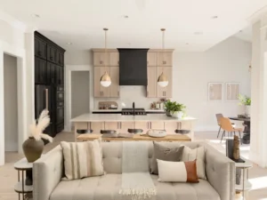 a living room with a couch and a table. related to How to Build a Modern Interior That Doesn't Feel Cold or Dated