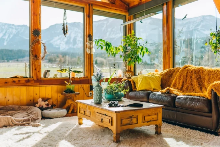 a living room filled with furniture and lots of windows. related to Sustainable Home Decor That Doesn't Look Rustic: A Modern Guide to Eco-Friendly Interiors