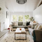 Country living room (IG: @clay.banks). related to Small Changes, Big Impact: How Intentional Layering Creates a Cozy Living Room on a Budget